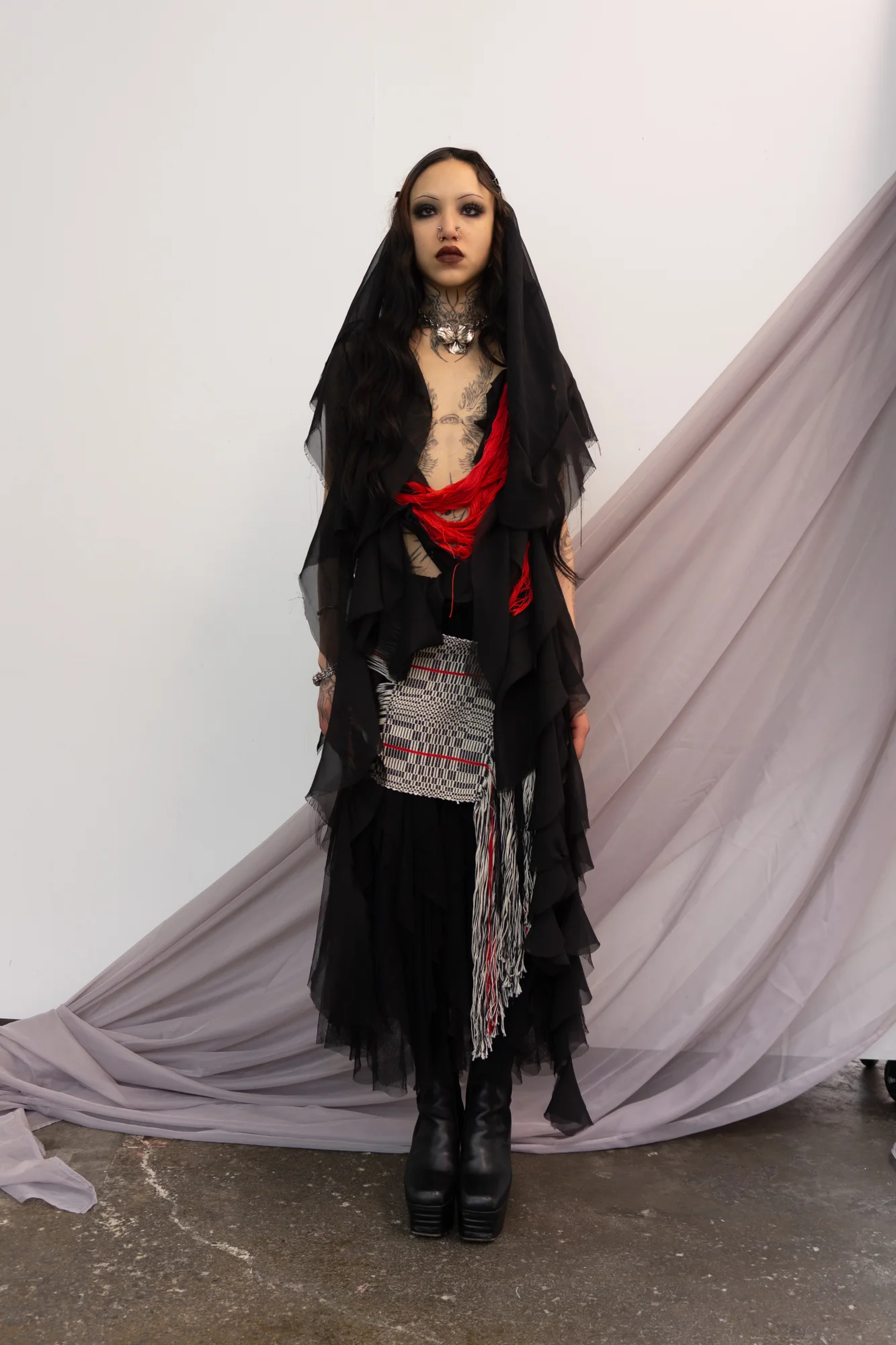 Black sheer layers with red accents